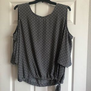 Dressy top with showy shoulder detail